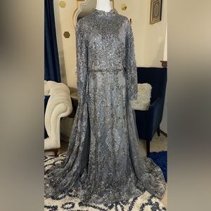 A Stunning heavy beautiful dress gown, long sleeve.
